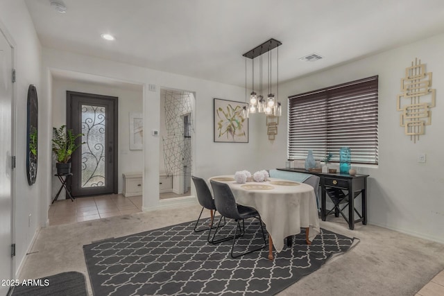 4010 W Coles Rd, Laveen, AZ 85339 - tiled dining area featuring carpet flooring, baseboards, and recessed lighting