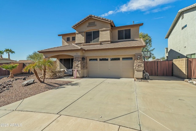 front of property featuring a garage