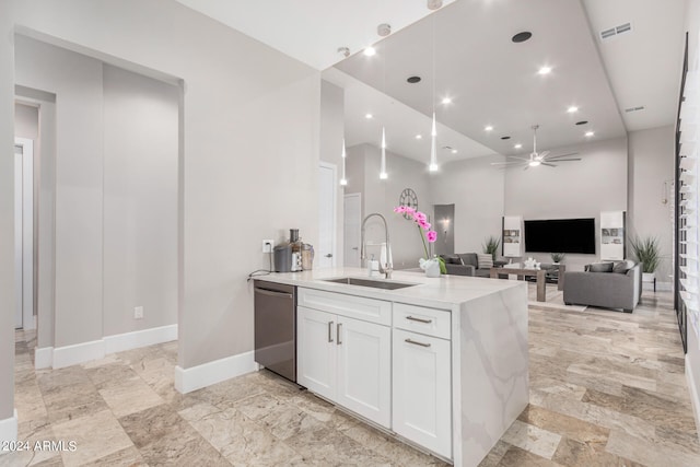 kitchen with white cabinets, sink, high vaulted ceiling, dishwasher, and ceiling fan