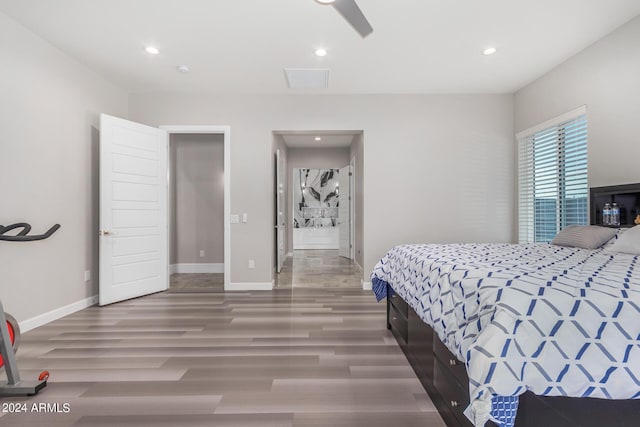 bedroom featuring a ceiling fan, recessed lighting, wood finished floors, and baseboards