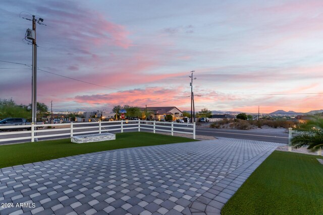 view of patio terrace at dusk