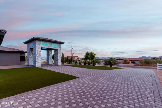 patio terrace at dusk with a yard