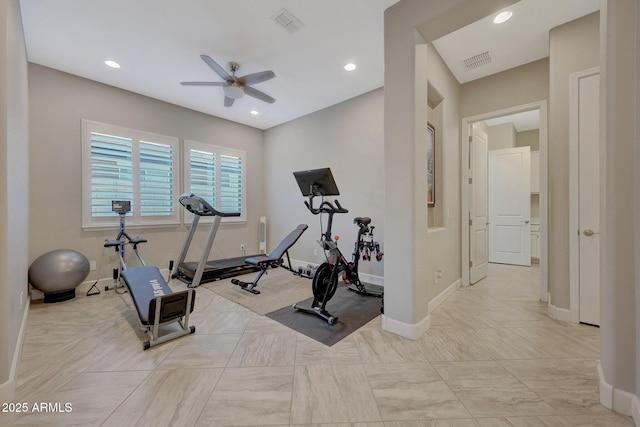 exercise room with ceiling fan