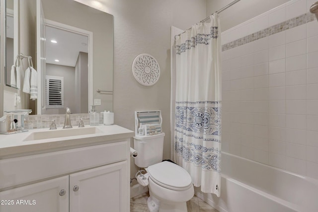 full bathroom with vanity, toilet, and shower / tub combo