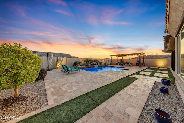 pool at dusk with a pergola and a patio