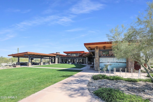 view of community featuring a yard