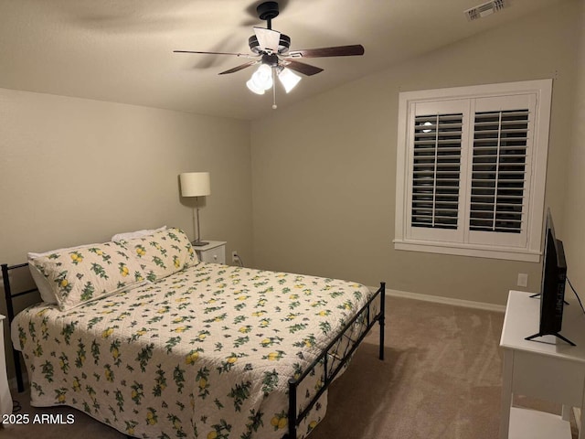 carpeted bedroom with visible vents, baseboards, and ceiling fan