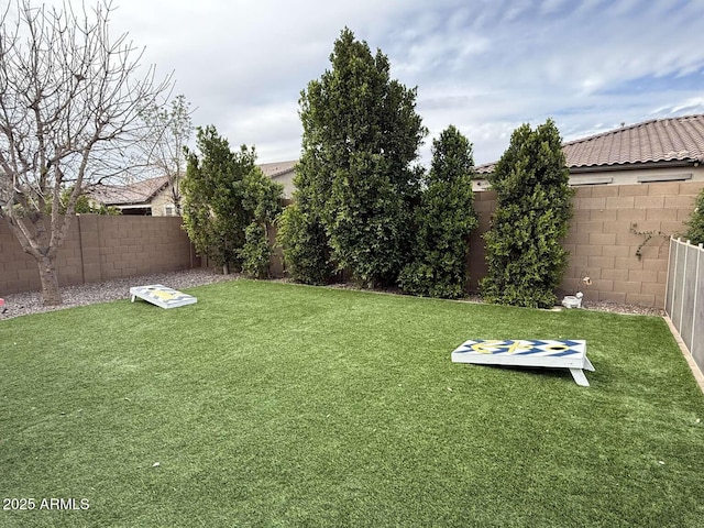 view of yard featuring a fenced backyard