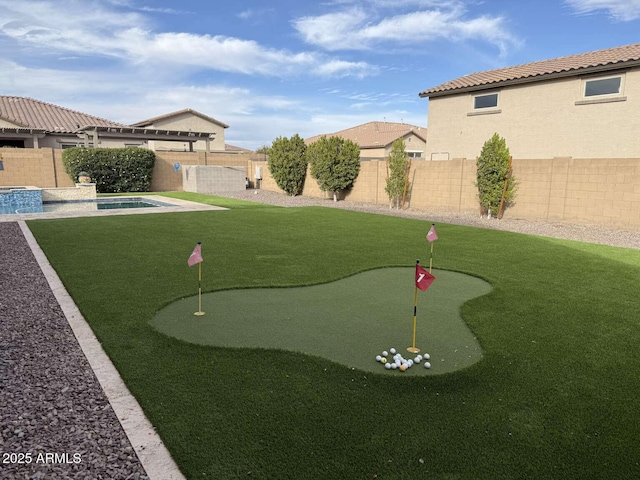 view of yard with a fenced in pool and a fenced backyard