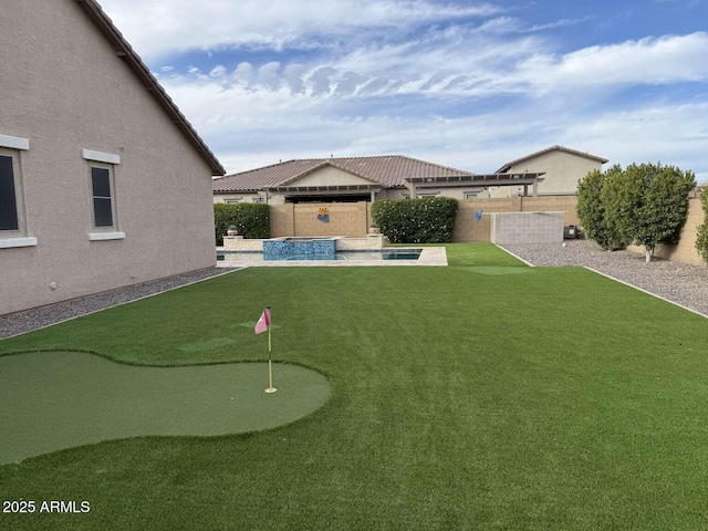 view of yard with a fenced in pool, a patio, and a fenced backyard