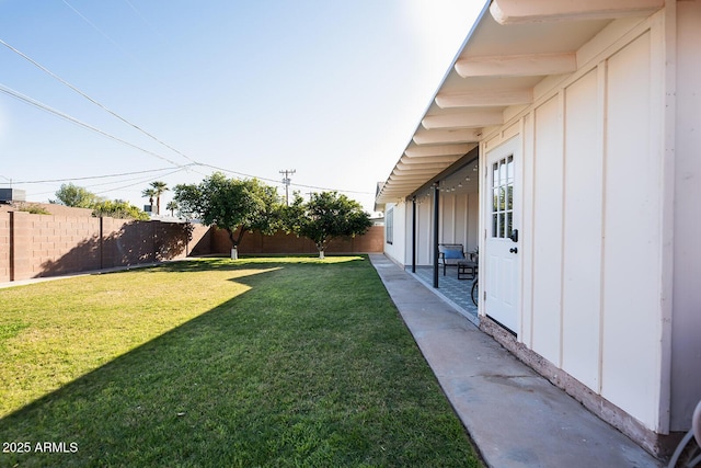 view of yard with a patio area