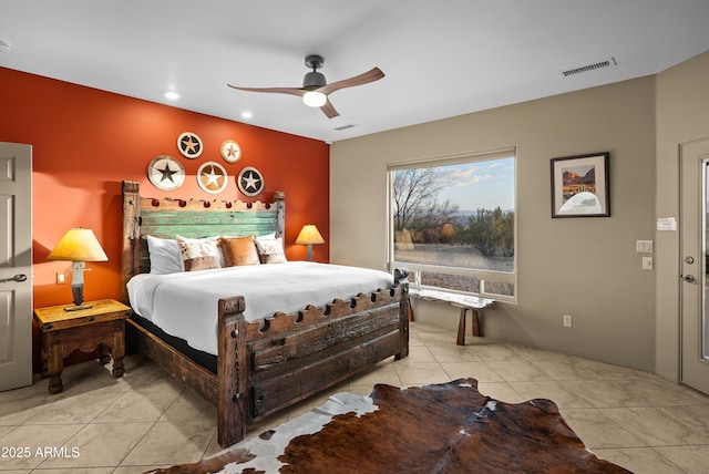 bedroom featuring ceiling fan and light tile patterned floors