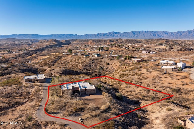 aerial view featuring a mountain view