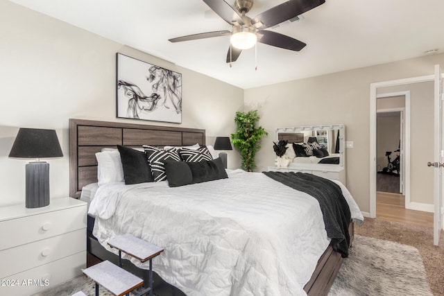 bedroom featuring ceiling fan and hardwood / wood-style floors