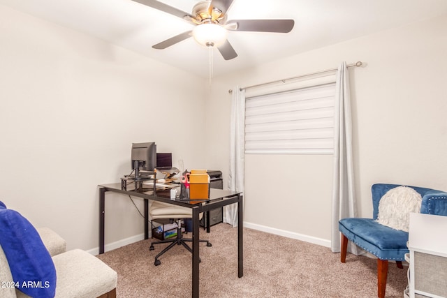 carpeted home office with ceiling fan