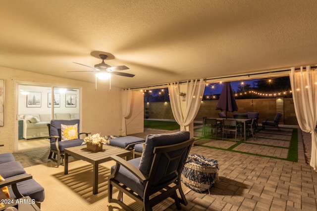 view of patio / terrace featuring outdoor lounge area and ceiling fan