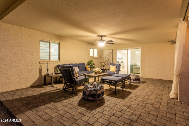 view of patio / terrace featuring ceiling fan and an outdoor hangout area