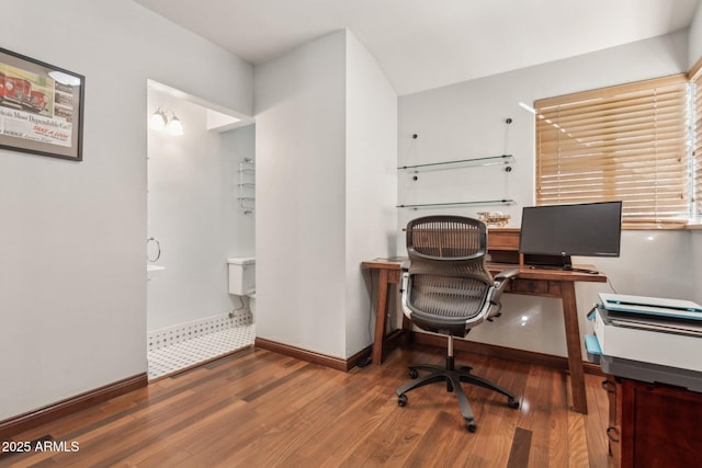 office area with wood finished floors and baseboards