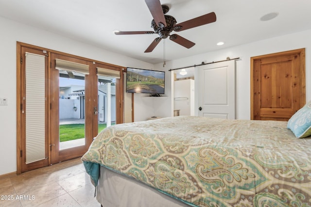 bedroom with a barn door, recessed lighting, a ceiling fan, access to exterior, and french doors