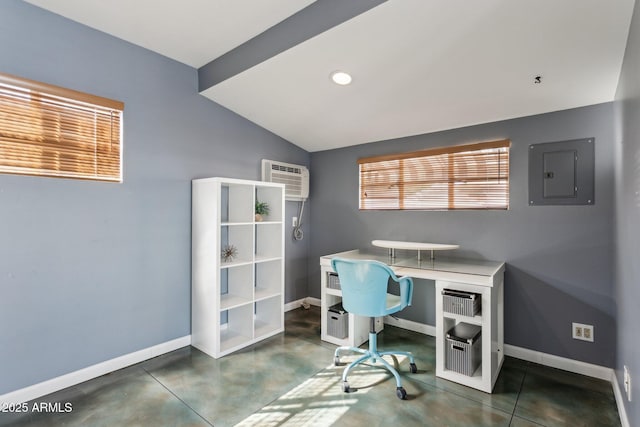 office featuring a wall mounted AC, vaulted ceiling, concrete flooring, electric panel, and baseboards