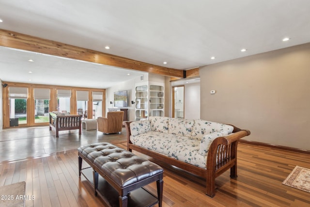 living area with beam ceiling, baseboards, hardwood / wood-style floors, and recessed lighting