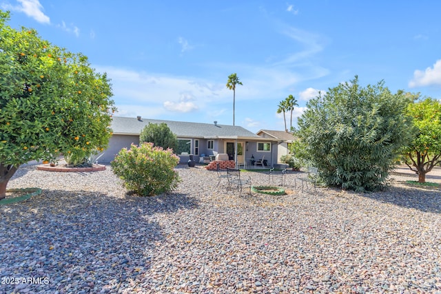 view of front of home featuring a patio area