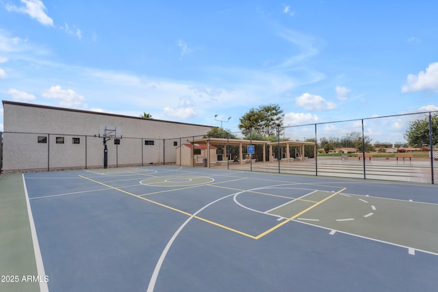 view of sport court with community basketball court and fence