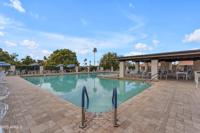 pool featuring a patio area