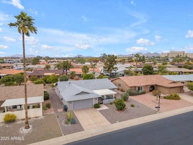 aerial view with a residential view and a mountain view