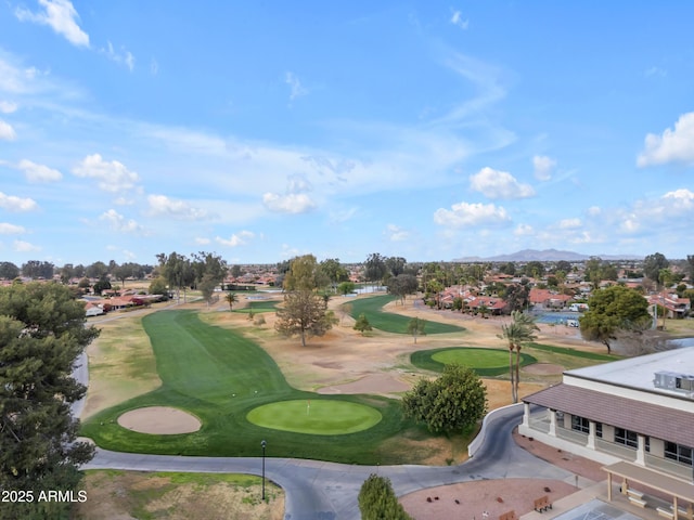 view of property's community with a mountain view and golf course view