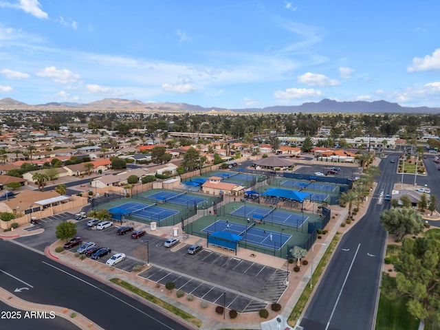 birds eye view of property featuring a mountain view