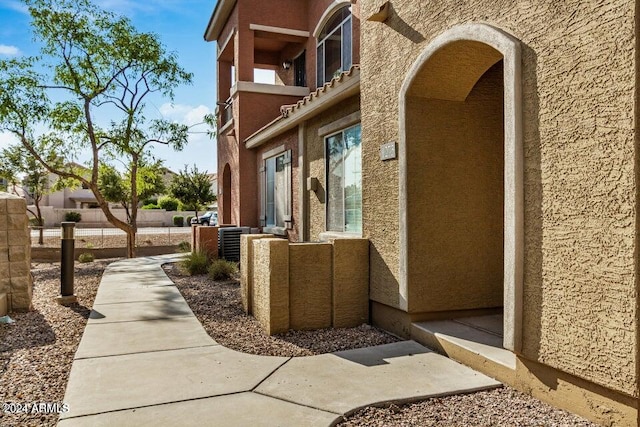 exterior space featuring a balcony and central AC