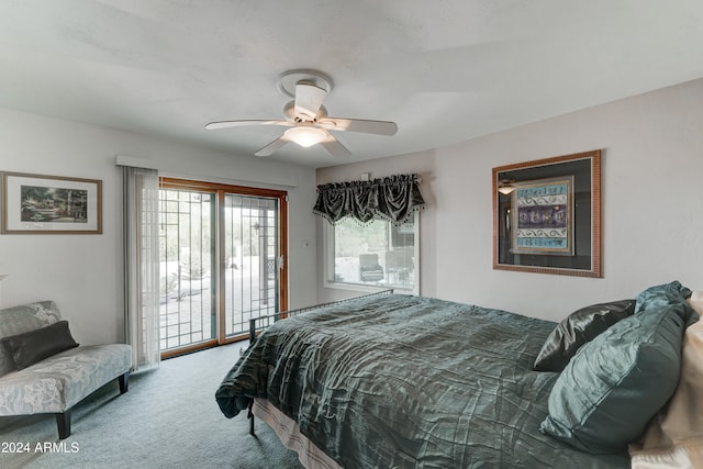 carpeted bedroom featuring access to outside and ceiling fan