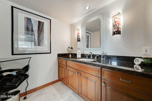 bathroom featuring vanity and tile patterned floors