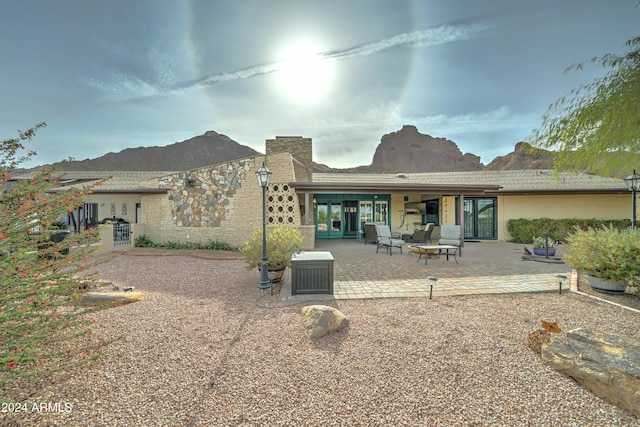 rear view of property with a patio