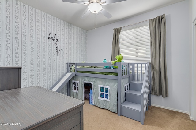 carpeted bedroom featuring ceiling fan