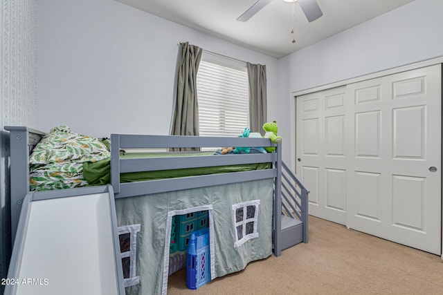 bedroom featuring a closet, carpet floors, and ceiling fan