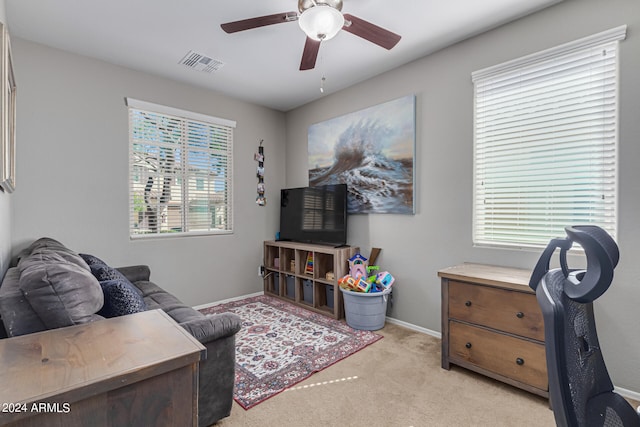 interior space featuring ceiling fan