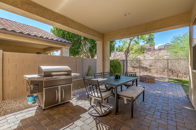 view of patio / terrace featuring a grill