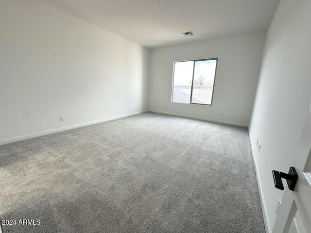 empty room with carpet floors