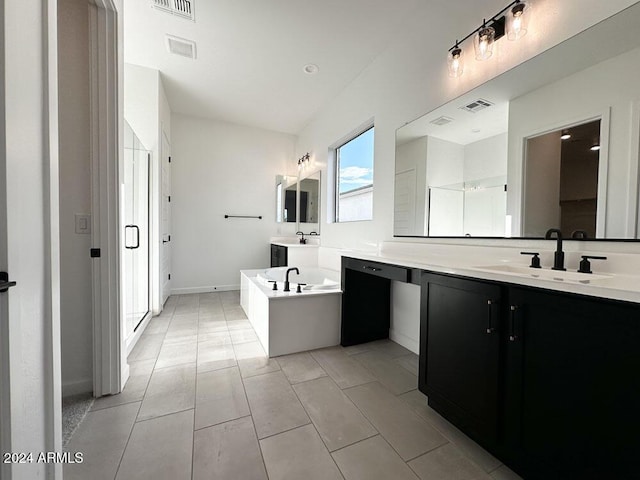 bathroom featuring vanity and a washtub