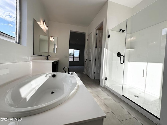 bathroom with vanity, separate shower and tub, and tile patterned floors