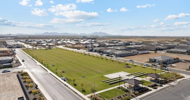 birds eye view of property with a mountain view