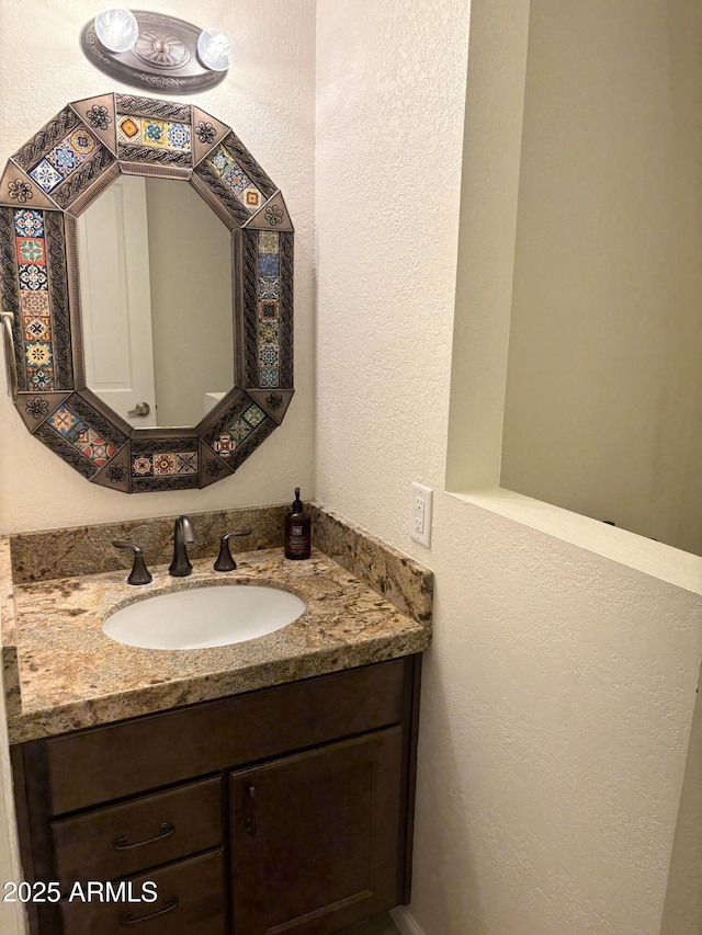 8426 N 15th Dr, Phoenix, AZ 85021 - bathroom with a textured wall and vanity