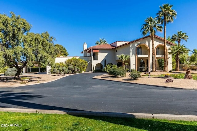 8426 N 15th Dr, Phoenix, AZ 85021 - view of front of house featuring stucco siding and a chimney