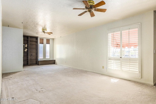 8426 N 15th Dr, Phoenix, AZ 85021 - empty room with carpet, a textured ceiling, and ceiling fan