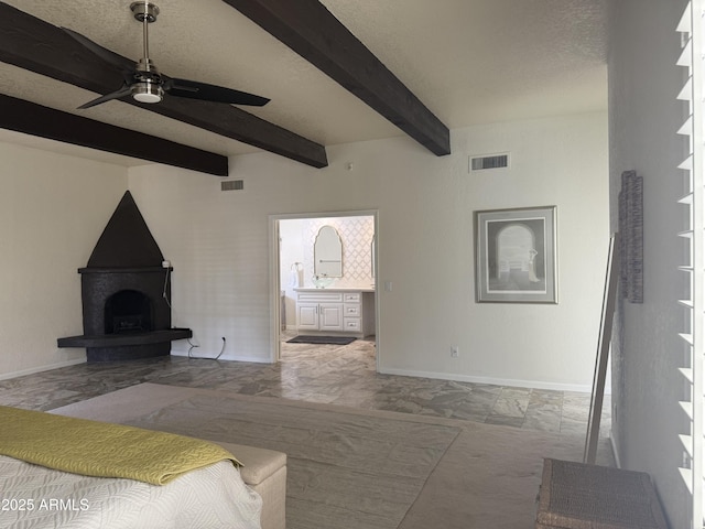 8426 N 15th Dr, Phoenix, AZ 85021 - bedroom featuring ensuite bath, baseboards, beamed ceiling, and visible vents