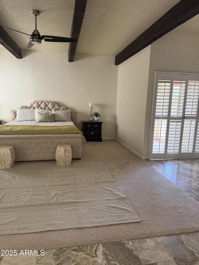 8426 N 15th Dr, Phoenix, AZ 85021 - carpeted bedroom featuring beamed ceiling and baseboards