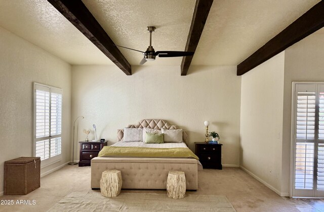 8426 N 15th Dr, Phoenix, AZ 85021 - bedroom featuring light carpet, baseboards, and multiple windows