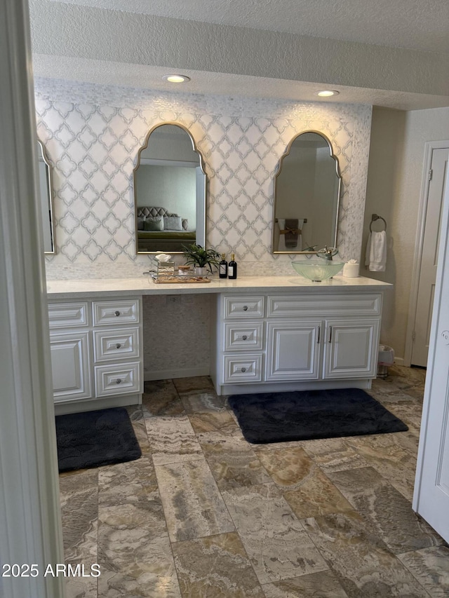 8426 N 15th Dr, Phoenix, AZ 85021 - full bath featuring recessed lighting, a textured ceiling, and vanity